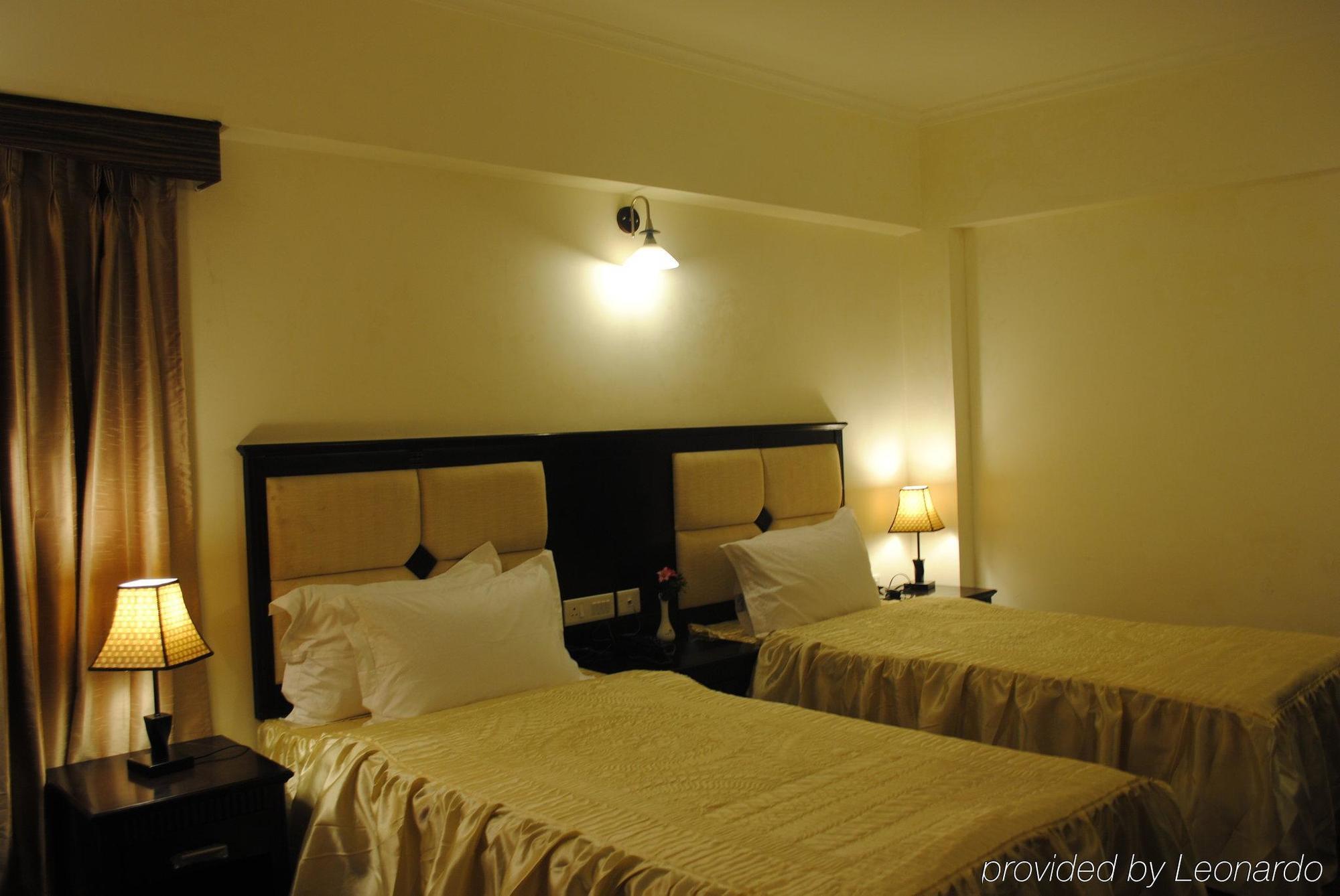 R.J.Resorts Darjeeling  Rom bilde